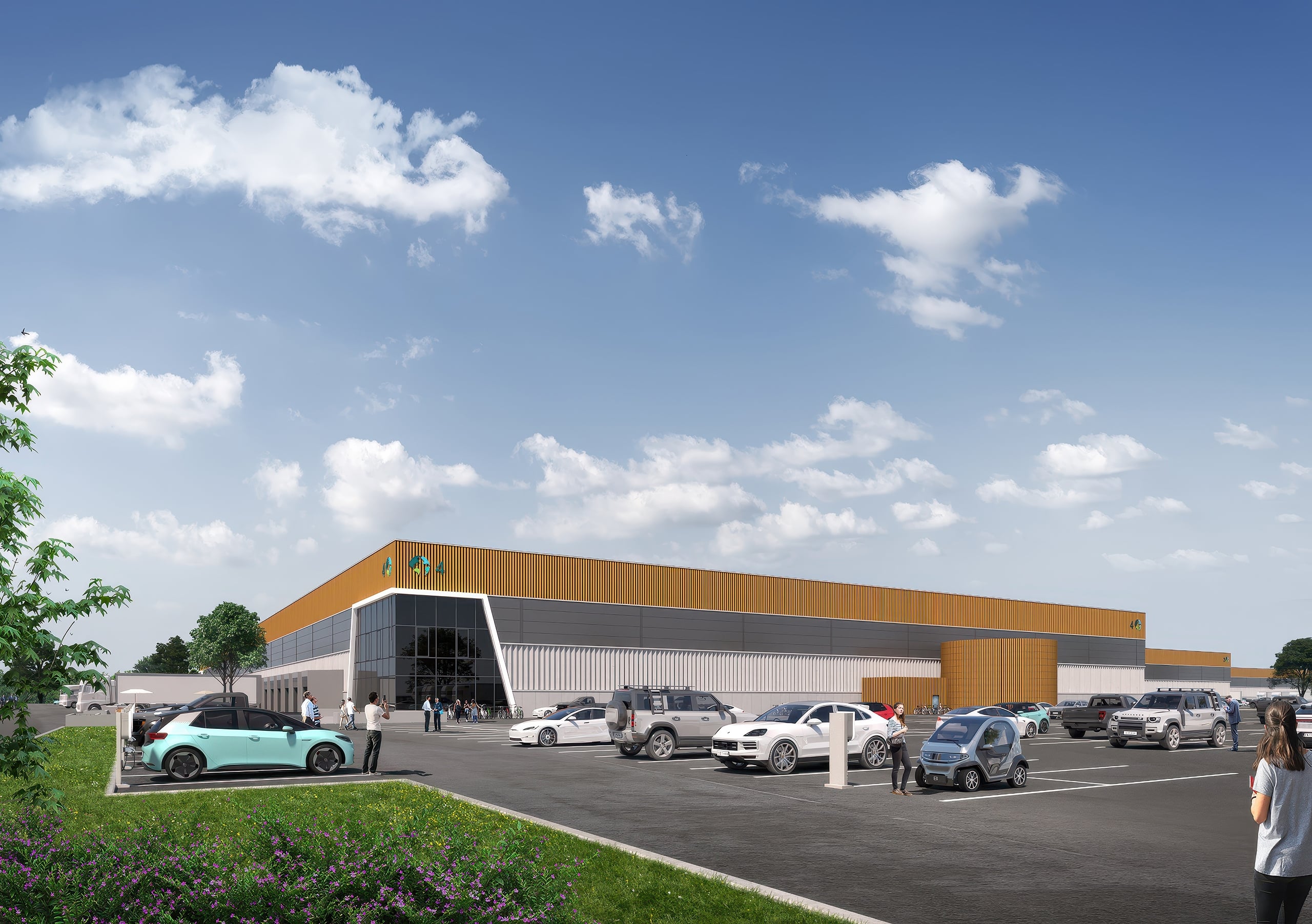 Ground-level view of a Prologis Parklife building entrance with glazed facade, landscaping, cars and people