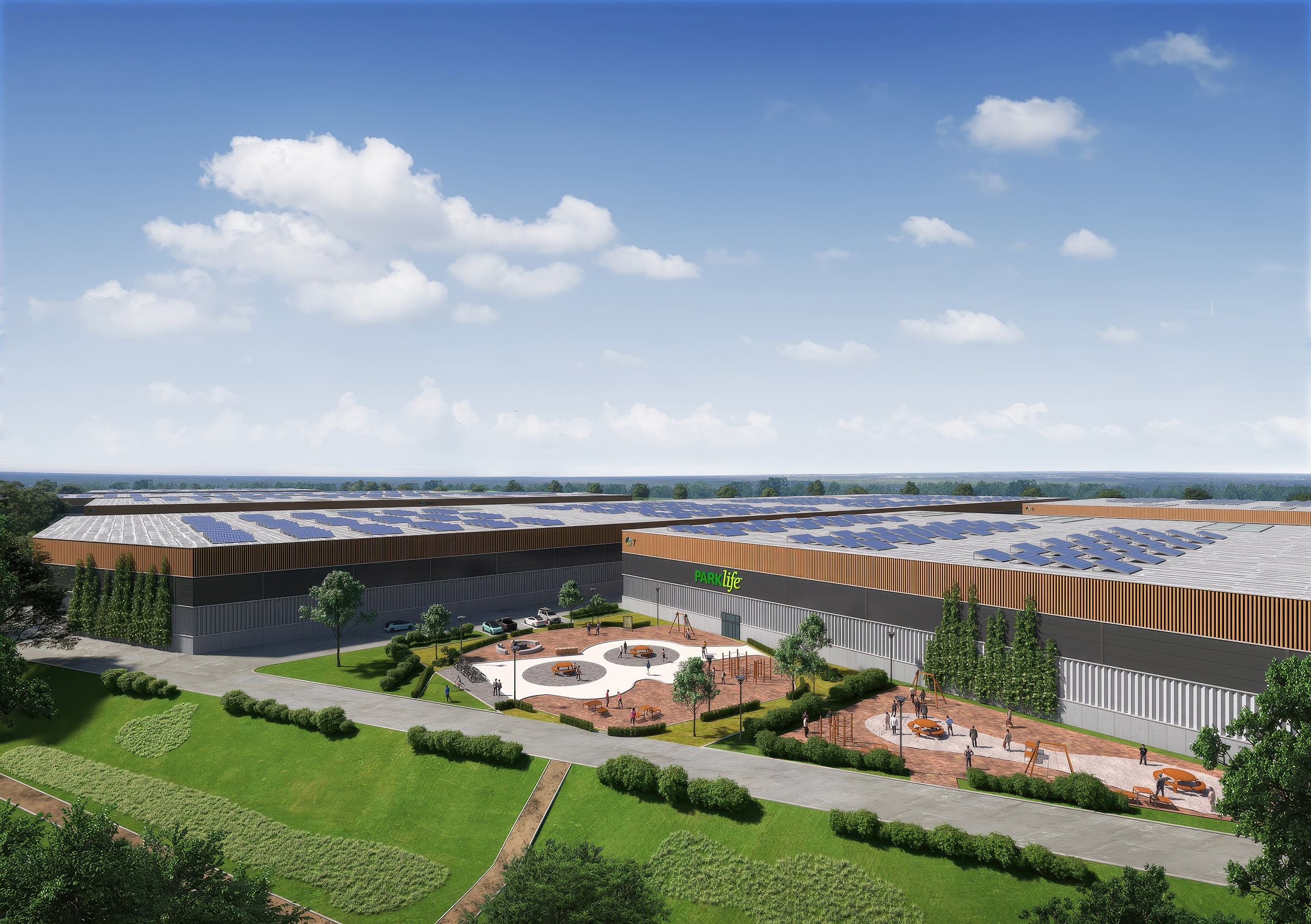 Elevated view of a Prologis Parklife logistics building with solar-panelled roof, landscaping and outdoor gym