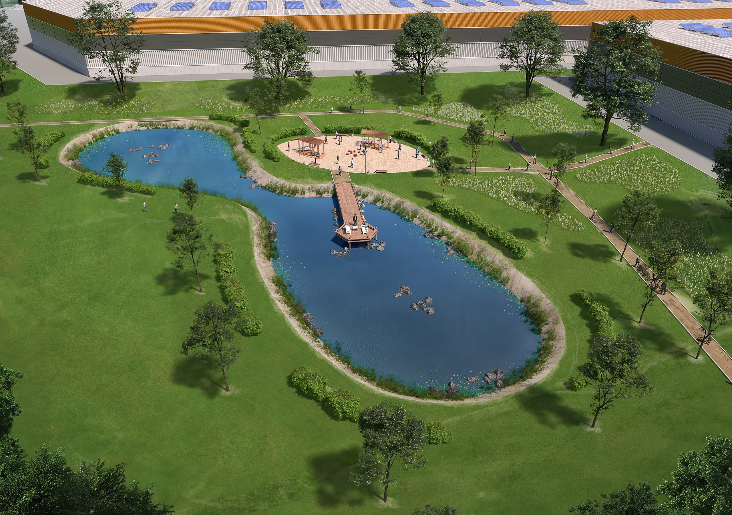 Landscaped Parklife recreation area with pond, timber jetty, walking paths and logistics buildings in the background